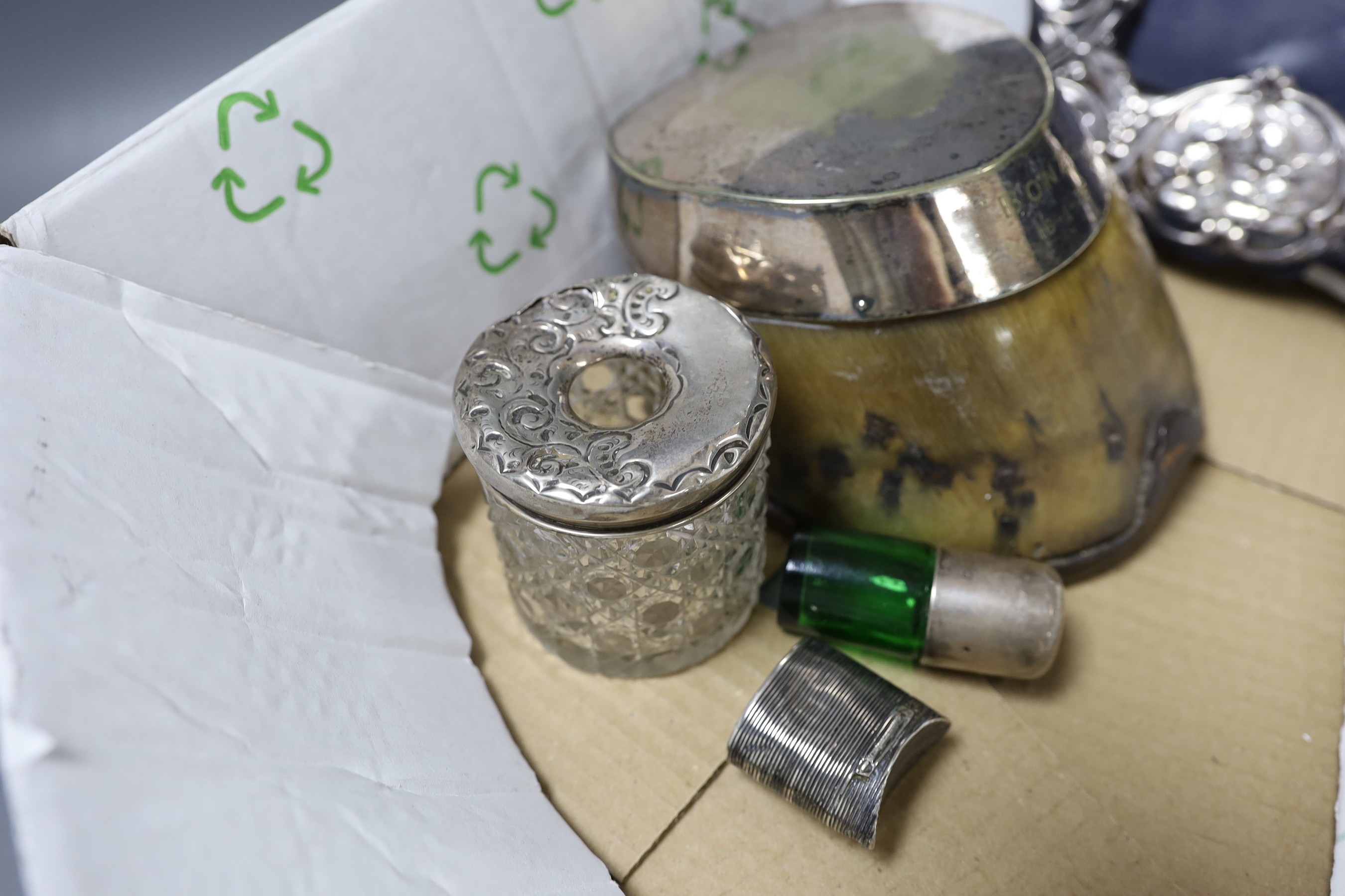 A modern silver mounted photograph frame, a plated mounted horseshoe and three other items.
